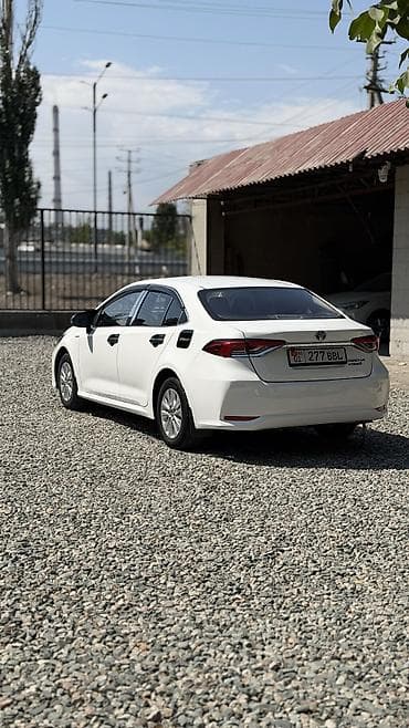 corolla e120: Toyota Corolla: 2022 г., 1.8 л, Вариатор, Гибрид, Седан — 7
