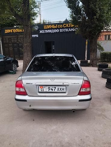 mazda mx5: Mazda 323: 1999 г., Механика, Хэтчбэк — 7