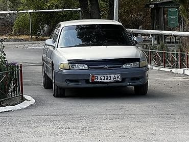 mini cuper: Mazda 626: 1993 г., 2 л, Седан — 6