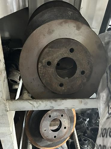 диск колесо: Комплект тормозных дисков Nissan — 1