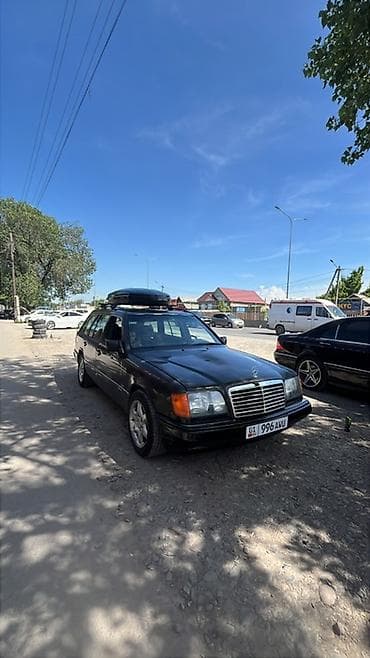 значок от мерса: Mercedes-Benz W124: 1995 г., Универсал — 2