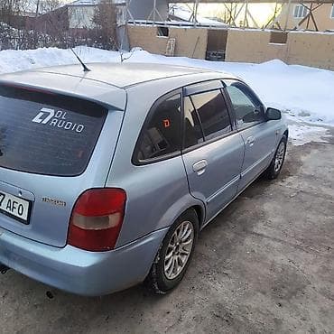 мазда тибут: Mazda 323: 2003 г., Универсал — 1