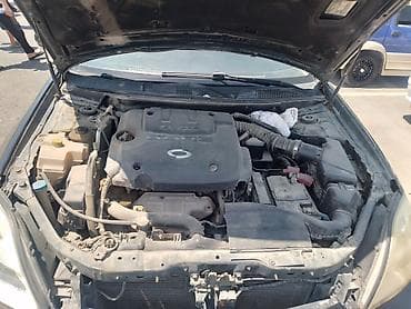 corolla s: Nissan Teana I (J31), черный седан бизнес-класса. Основные — 1