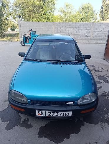 smart car: Mazda 121: 1991 г., 1.3 л, Механика, Бензин, Седан — 1