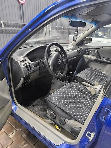 форд мазда: Mazda Familia: 2001 г., 1.6 л, Ручные, Бензин, Универсал — 8