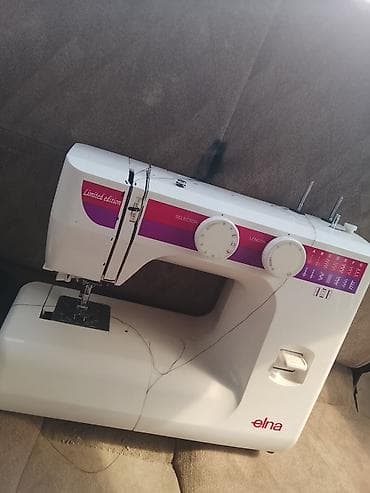 Тигүүчү машина Elna, Электромеханикалык