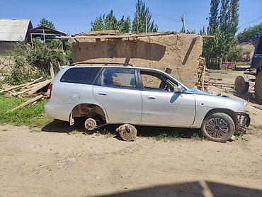 Daewoo Nubira: 1999 г., 1.6 л, Механика, Бензин, Универсал