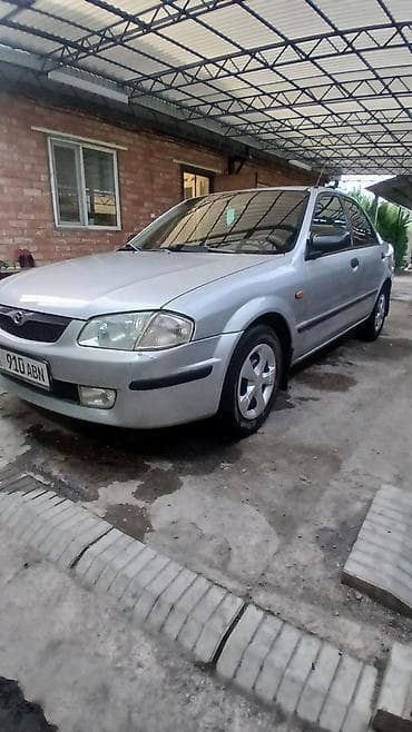 Mazda 323: 1999 г., 1.5 л, Ручные, Бензин, Седан