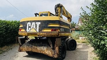 ef m: Экскаватор, Caterpillar, Колесный — 3