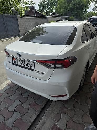тойота королла 2022: Toyota Corolla: 2022 г., 1.8 л, Вариатор, Гибрид, Седан — 8