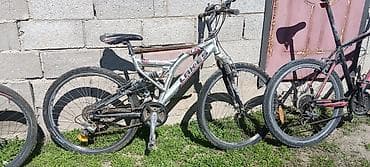 Велосипеддер: 1) Giant Revel (красно‑чёрный хардтейл) - Колёса 26" с полугладкими — 2