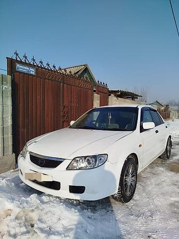 mazda 323 авто: Mazda Familia: 2001 г., 1.3 л, Автомат, Бензин, Седан — 2
