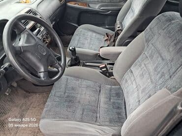 с авто: Mazda 626: 1997 г., 1.8 л, Механика, Бензин, Седан — 9