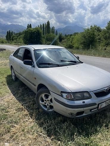 газ 69: Mazda 626: 1999 г., 1.8 л, Бензин, Седан — 4
