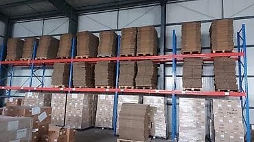 Продаю стеллажи 19 шт высота 5 метров Ширина 2,5 Цена 40000 за шт