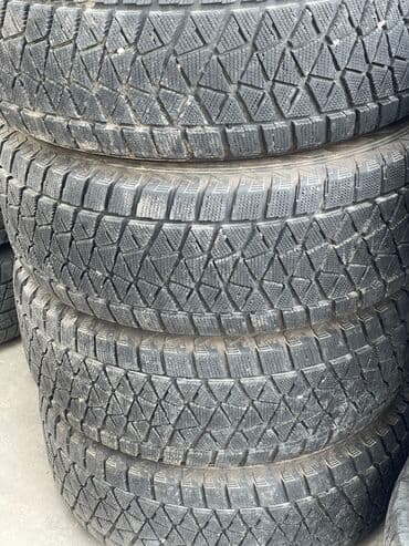 скупка титановых дисков: Шины 285 / 60 / R 18, Зима, Б/у, Пара, Внедорожные (АТ/МТ), Япония, Bridgestone — 1