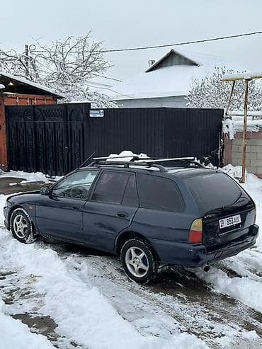 Mitsubishi: Mitsubishi Lancer: 1994 г., Универсал — 5