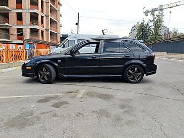gilera runner: Mazda 323: 2002 г., 1.6 л, Автомат, Бензин, Хэтчбэк — 4
