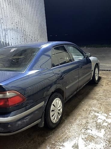 авто мотор: Mazda 626: 1999 г., Седан — 3