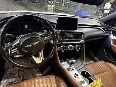 Genesis G70 — интерьер бизнес-класса - Роскошный салон из коричневой