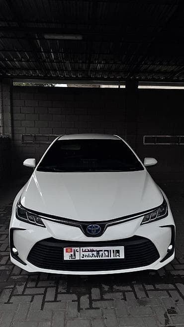 Toyota Corolla: 2022 г., 1.8 л, Автомат, Гибрид, Седан