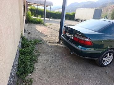 Унаа сатуу: Mazda 626: 1999 г., 1.8 л, Кол менен иштөөчү, Бензин, Седан — 3