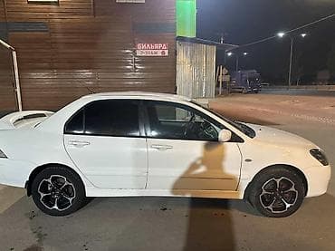 Транспорт: Mitsubishi Lancer: 2005 г., 2 л, Механика, Бензин, Седан — 3