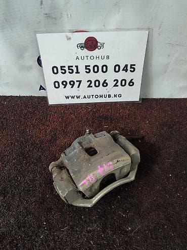 Передний левый суппорт Kia 2016 г., Б/у, Оригинал