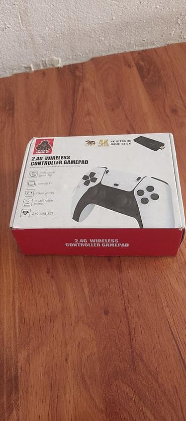 самый дешёвый xbox: Беспроводной игровой комплект 2.4G: приставка Game Stick + 2 геймпада — 1