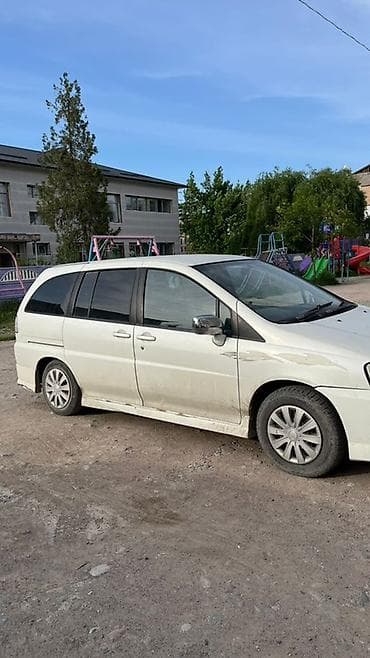 айнек авто: Nissan Liberty: 2001 г., 2 л, Вариатор, Бензин, Вэн/Минивэн — 2