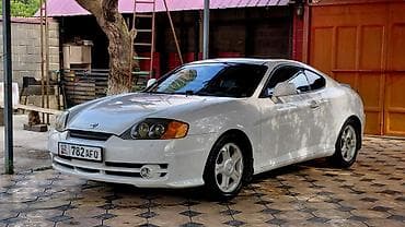 down pipe: Hyundai Tiburon: 2003 г., Купе — 4