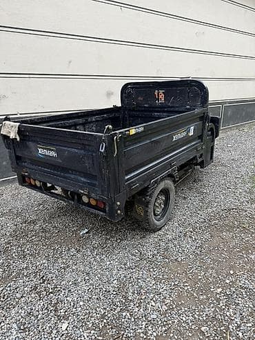 дорожные фишки: Грузовой электротрицикл JELMAYAN / «Желмаян» с открытым кузовом — 3