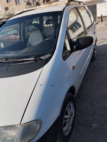 возможен обмен на дом: Ford Galaxy: 1998 г., 2 л, Механика, Бензиновая, Минивэн — 14