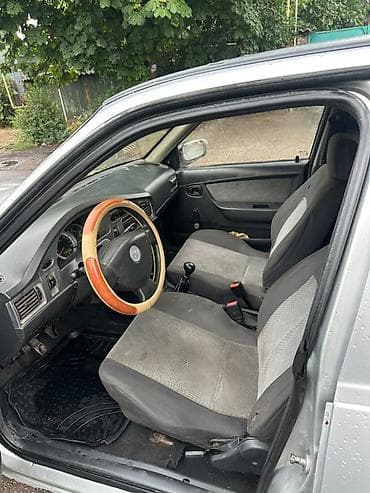 Унаа: Daewoo Nexia: 2011 г., 1.6 л, Кол менен иштөөчү, Бензин, Седан — 8