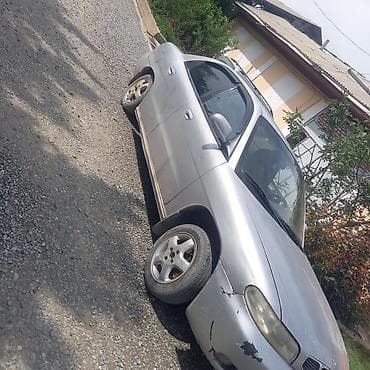 ниссан нубира: Daewoo Nubira: 1996 г., 1.6 л, Механика, Бензин, Седан — 4