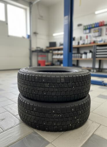 покрышки на ниву: Шины 235 / 60 / R 18, Зима, Б/у, Пара, Внедорожные (АТ/МТ), Китай — 1