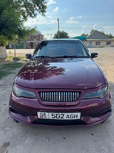 mini cuper: Легковой автомобиль седан, 4 двери, бордовый металлик с черной крышей — 1