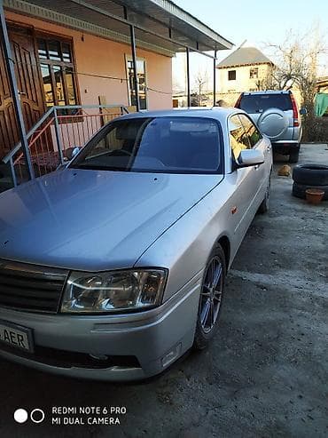 киа кларус: Nissan Gloria: 1999 г., Автомат — 2