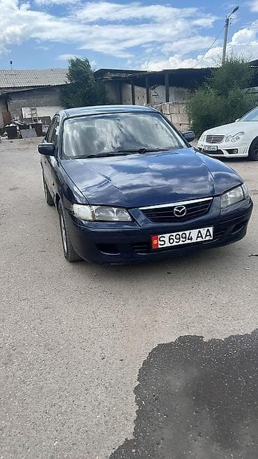 124 e500: Mazda 626: 2000 г., 2 л, Механика, Бензин, Седан — 5