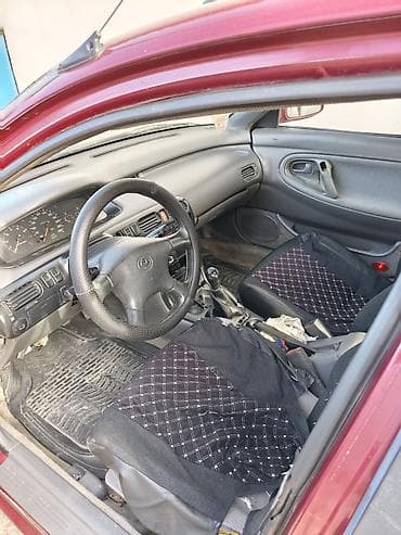 полки на авто: Mazda 626: 1993 г., Лифтбек — 5