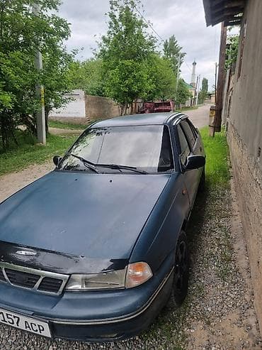 Daewoo Nexia: 2004 г., 1.6 л, Механика, Бензин, Седан