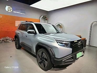 wuling mini ev: Электрический кроссовер (5 дверей, 5 мест) в светло‑сером цвете с — 3