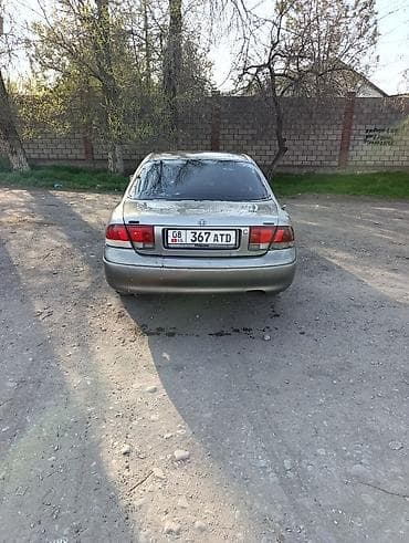 голы двойка: Mazda Cronos: 1992 г., 2 л, Ручные, Бензин, Седан — 4