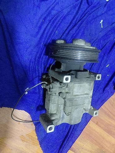 Автозапчасти: Компрессор Mazda 2003 г. — 2