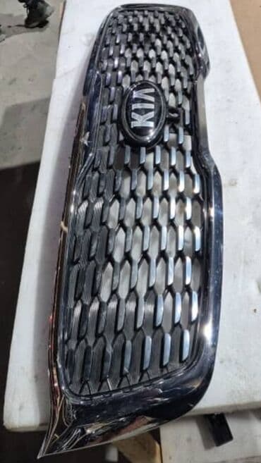 коробка воздушного фильтра: Решетка радиатора Kia Оригинал — 3