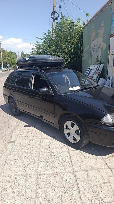 adblue бишкек: Автомобиль универсал черного цвета с аэродинамическим багажным боксом — 3