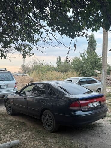 выкуп машина берилет: Mazda 626: 1995 г., 1.8 л, Механика, Бензин, Хетчбек — 1