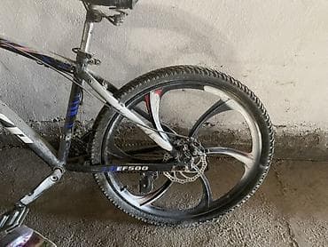 Горный велосипед (хардтейл) с литых дисковыми колесами Основные at lalafo.kg Горный велосипед (хардтейл) с литых дисковыми колесами Основные