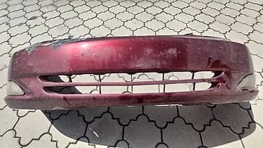 Б/У передний бампер Toyota Camry 30, есть шпатли. На фото видно, цена