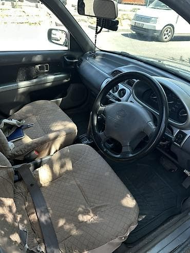 Унаа: Nissan Март: 2001 г., 1.3 л, Автомат, Бензин, Хетчбек — 2